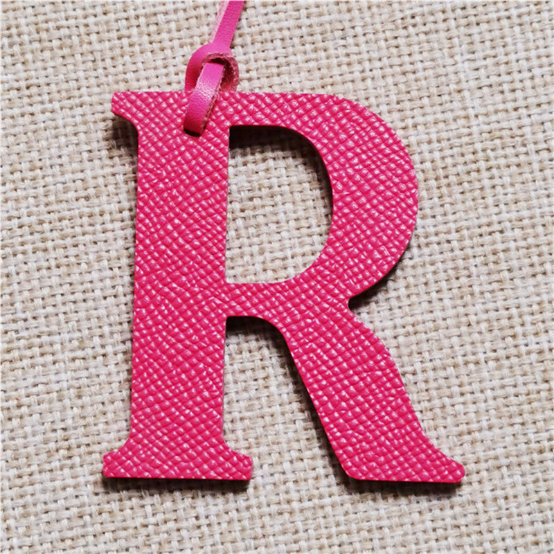 سلسلة مفاتيح من الجلد الطبيعي  - مراجعة Monogram Keychain Leather وسعره